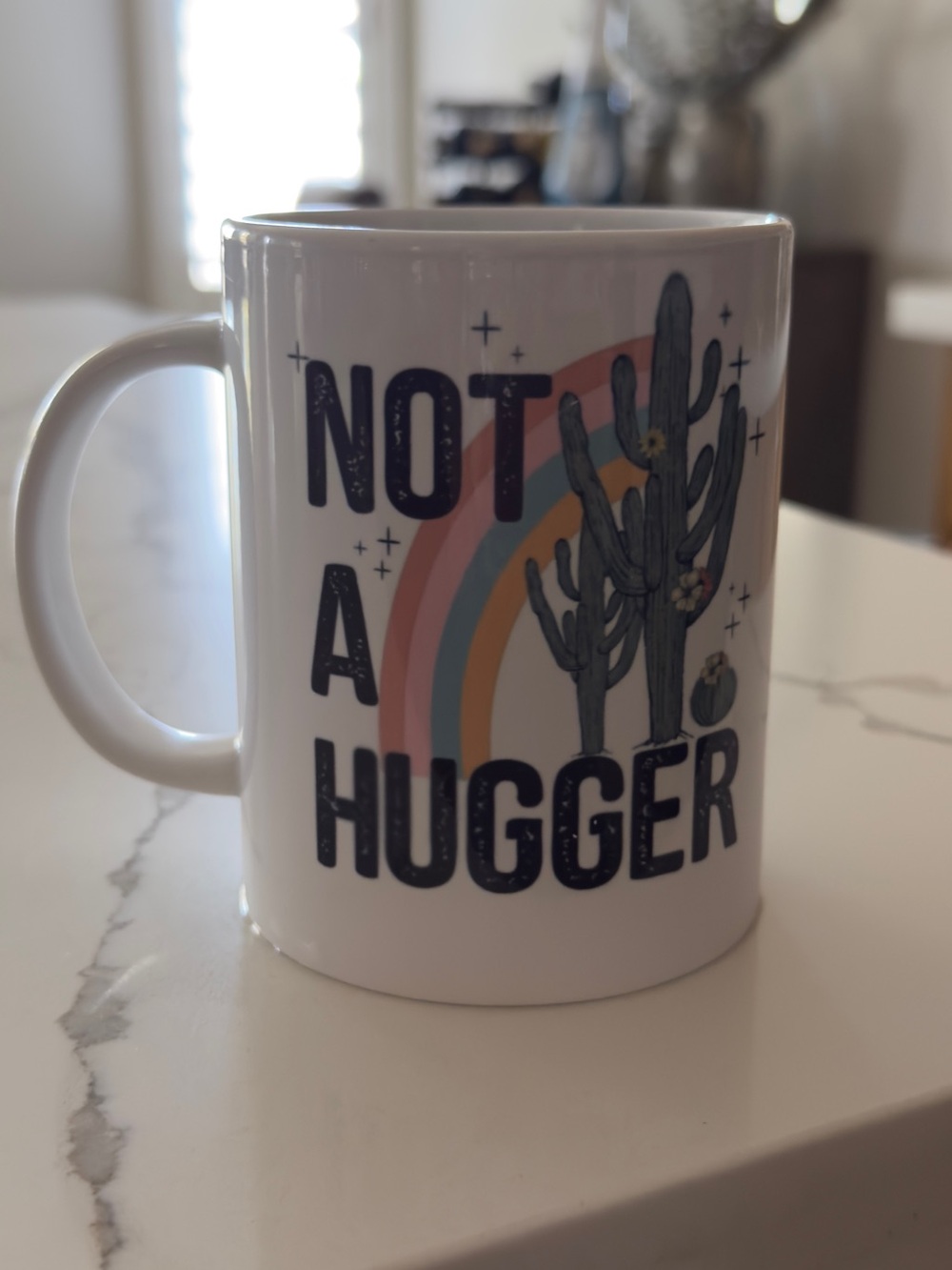 Not A Hugger" Desert Cactus & Boho Rainbow Ceramic Mug (15 oz)